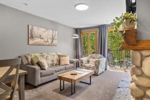 Creekside Condo Steps from Main Street Mountain Views Fireplace