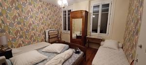 Sejours chez l'habitant Chez Virginie - chambre du Bourg : photos des chambres