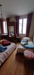 Sejours chez l'habitant Chez Virginie - chambre du Bourg : photos des chambres