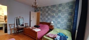 Sejours chez l'habitant Chez Virginie - chambre du Bourg : photos des chambres