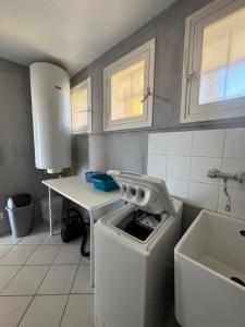 Appartements Front de mer 100m2 Vue magnifique, balcon, jardin, garage : photos des chambres