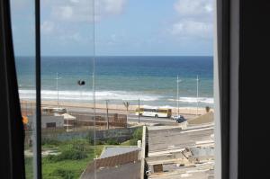 Apartamento decorado com vista para o mar