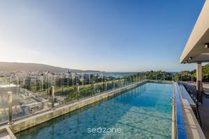 Sua estadia exclusiva com piscinas e jacuzzi a 500m da praia - ELF