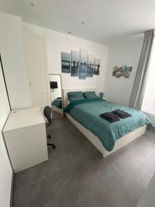 Appartements Studio a cote du parc des expositions porte de Versailles, proche metro : photos des chambres
