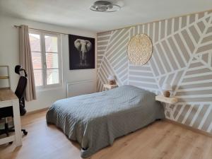 Appartements Au bord de la Dordogne : photos des chambres