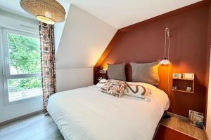 Maisons de vacances Charmante maison avec jardin pres des plages : photos des chambres