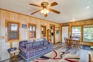 Lakefront Ozark Cottage Deck with Covered Dock!