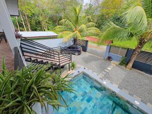 AJ Suites - Modern Beach Apartments with Pool and Full Kitchen