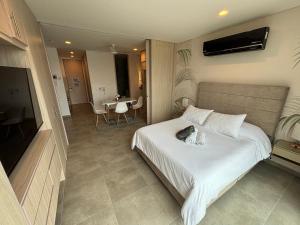 Hermoso y moderno Loft con Piscinas, vista al Mar y cerca de la Playa