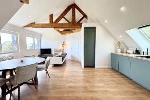 Appartements Duplex T3 - Au coeur des chenes : photos des chambres