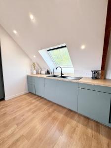 Appartements Duplex T3 - Au coeur des chenes : photos des chambres