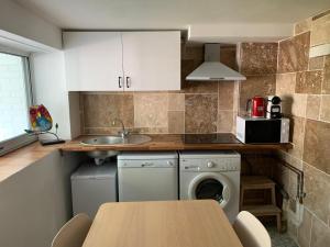 Appartements Appartement familial au bord de la Marne, jardin tropical , piscine, tennis, terrasse, parking gratuit proche Disneyland : photos des chambres