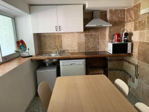 Appartements Appartement familial au bord de la Marne, jardin tropical , piscine, tennis, terrasse, parking gratuit proche Disneyland : photos des chambres