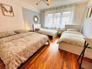 Appartements 1 STUDIO & 5 APPTS - 1 a 4 lits - 1 a 7 pers - max 31 pers - 1 immeuble - Confort, Flexibilite ------ ENGLISH - 1 STUDIO & 5 APTS - 1 to 4 beds - 1 to 7 guests - up to 31 - same building -- Cattenom : Appartement