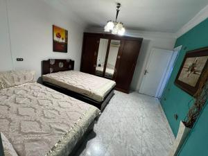 شقة فندقية ببرج فاخر علي كورنيش النيل المعادي مباشرةً