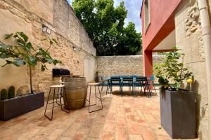 Maisons de vacances La Maison de la Place - Charming house with swimming pool & exposed stone : photos des chambres
