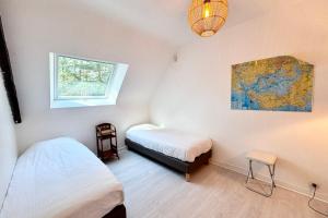Maisons de vacances DAR EL ASKRI Maison avec acces direct a la mer : photos des chambres