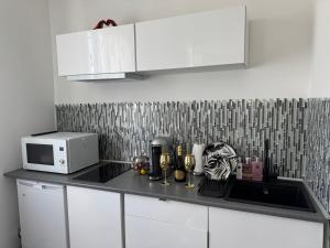 Appartements Maison Ariana : photos des chambres