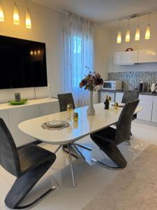 Appartements Maison Ariana : photos des chambres