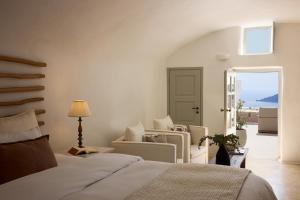 Honeymoon Suite with Sea View and Indoor Jetted Plunge Pool room in Iconic Santorini a Boutique Cave Hotel