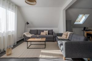 Appartements Appartement cosy avec parking : photos des chambres