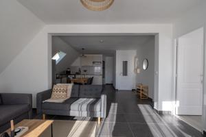 Appartements Appartement cosy avec parking : photos des chambres