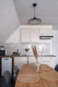 Appartements Appartement cosy avec parking : photos des chambres