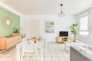 Appartements Cosy T2 a 100m de la Gare, parking gratuit, WiFi Fibre pour 4 personnes : photos des chambres
