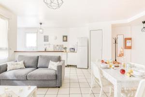 Appartements Cosy T2 a 100m de la Gare, parking gratuit, WiFi Fibre pour 4 personnes : photos des chambres