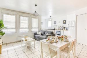 Appartements Cosy T2 a 100m de la Gare, parking gratuit, WiFi Fibre pour 4 personnes : photos des chambres