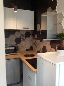 Appartements Le Petit Lys : photos des chambres