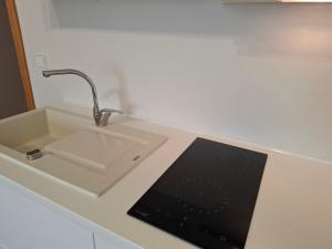 Apartamentai šalia baseino