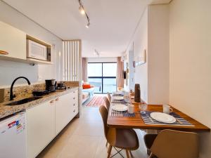 Apartamento de 1 quarto com piscina ao lado mar conforto e localização