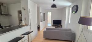 Appartements T2 coeur de ville avec terrasse : photos des chambres