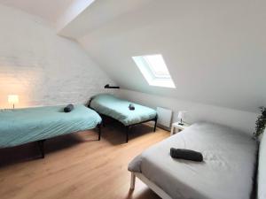 Maisons de vacances Maison 4 chambres Marcq-en-Baroeul : photos des chambres