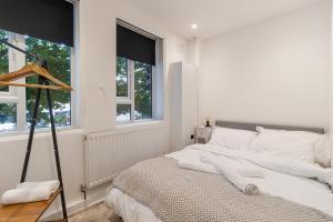 Stylish flat 10 mins from train, near Emirates & Camden