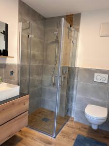 Apartment im Souterrain mit Terrasse