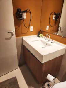 Flat aconchegante e completo