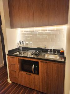 Flat aconchegante e completo