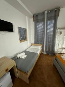 Habitación Triple con balcón