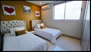 Oceanview Suite with two Pools, Gym & Guest Access