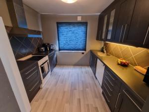Large and central 2 bedroom apartment with free parking, EV recharging and a private garden