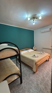Chambre Quadruple avec Salle de Bains Privative