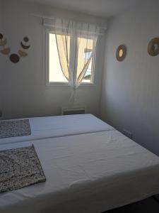 Appartements Joli cocon a Ajaccio avec terrasse vue mer : photos des chambres