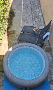 Appartements Le jardinet d-Emma - Appart RDC avec jacuzzi, parking, au calme : photos des chambres
