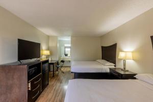 Queen Room with Two Queen Beds room in Executive Inn & Suites Beeville