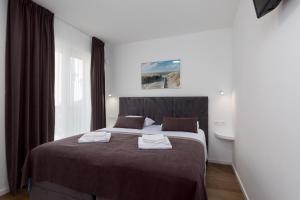 Apartments with parking space Porec - 24365