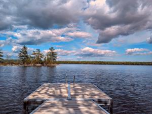 Cabin and Canvas Lakefront Retreat family beach 1dog fire pit