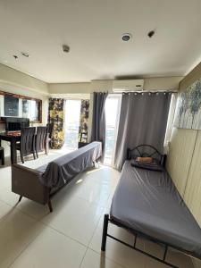 Breeze Deluxe Unit Roxas blvd