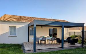 Maisons de vacances Les Merisiers - Maison moderne avec jardin : photos des chambres